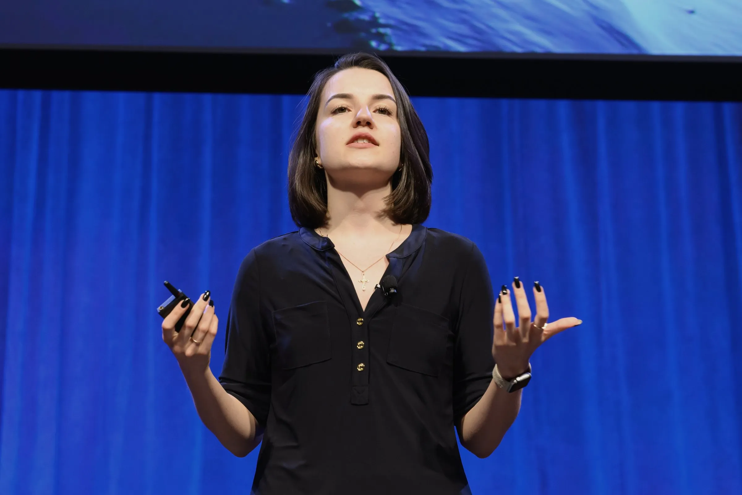 EQORE CEO Valeriia Tyshchenko presenting on stage